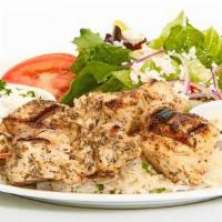 Chicken Kebob Feast · Marinated Chicken breast with a lemon tang. Served with our Taziki sauce. Served with Greek ...