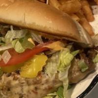 Willy'S Philly (Chicken Or Steak) With Fries · 8 oz. Super sub roll, stuffed with 5 oz of seasoned philly steak or chicken, grilled with re...