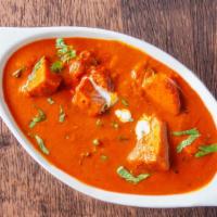 Chicken Tikka Masala · Chicken cooked in a delightfully spiced creamy tomato and paprika.
