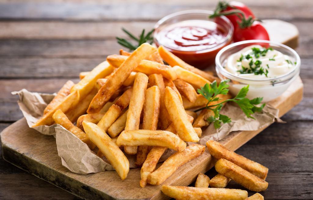 Vw'S French Fries · Basket of French Fries served with ketchup.