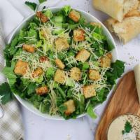 Classic Caesar Salad · Romaine, Parmesan Cheese, Italian Croutons, Caesar Dressing.