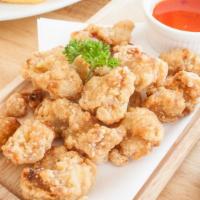 Karaage Chicken · Juicy and tender bite-sized chicken deep-fried till crispy.