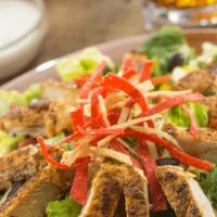 Southwest Chicken Salad · 680-1320 cal. Blackened chicken strips, served on a bed of fresh mixed greens, diced tomatoe...