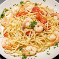 Shrimp Or Salmon Scampi · Black tiger shrimp or salmon filet with garlic in white wine scampi sauce over linguine pasta.