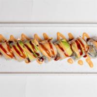 White Dragon Roll · Spicy. Shrimp tempura, cucumber roll, topped with white tuna and avocado.