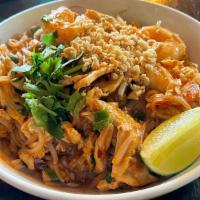Pad Thai · National noodle dish of Thailand made with rice noodles, bean sprouts, eggs & cilantro, serv...