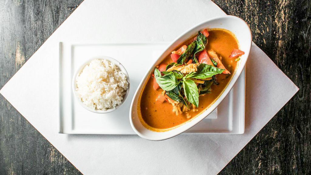 Red Curry  · Spicy. Choice of red curry, green curry, Massaman Curry, Panang Curry, all curry dishes served with Rice.