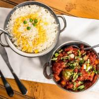 Chicken Chili · Cooked with bell pepper, onions, tomatoes, and hint of spicy chili sauce. Served with rice.