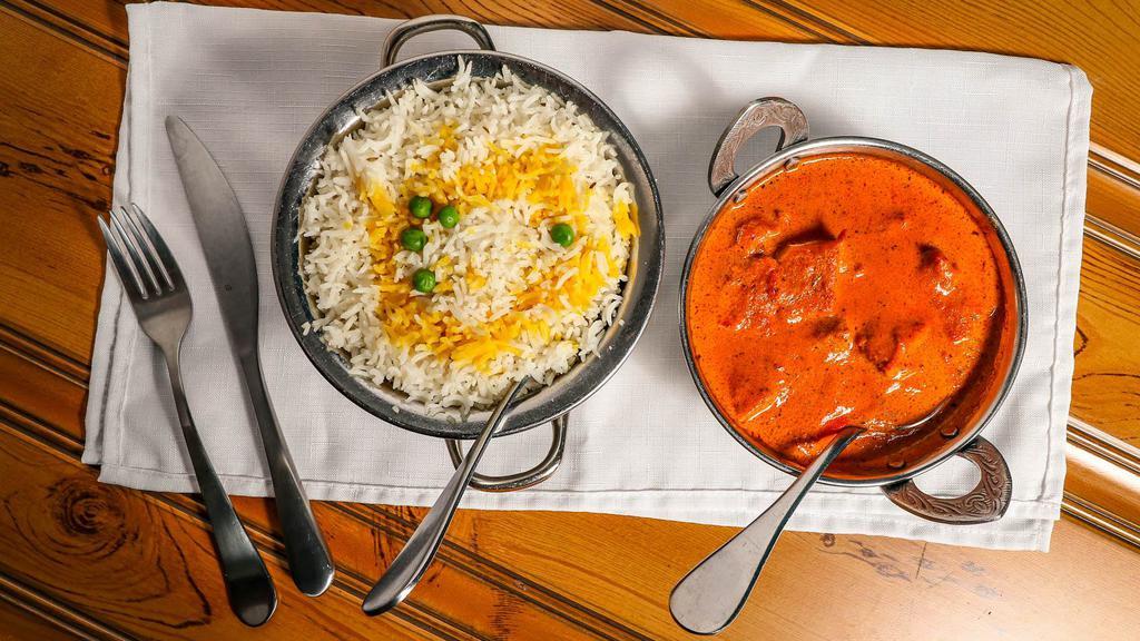 Chicken Tikka Masala · Chicken Breast meat cooked in paste of tomato, onions, fenugreek leaves, almond, and cashew nuts.