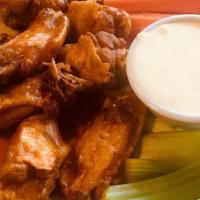Tavern Wings · A pound of crispy wings tossed in Tavern Signature Sauce, Buffalo Sauce or naked served with...
