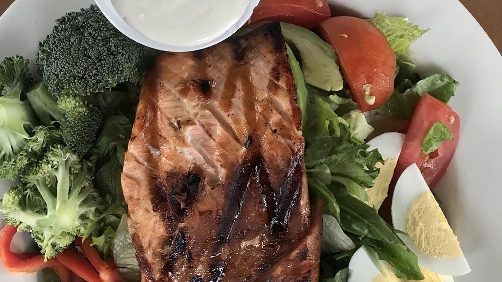 Coach Rob'S Grilled Salmon Salad · Mixed greens, egg, fresh raw broccoli, cucumber an sliced red peppers topped with marinated salmon with your choice of dressing.