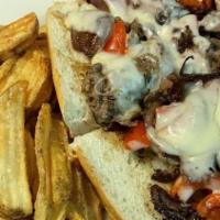 Steak Philly · Thin sliced steak sauteed with mushrooms, onions, peppers and provolone cheese served open f...