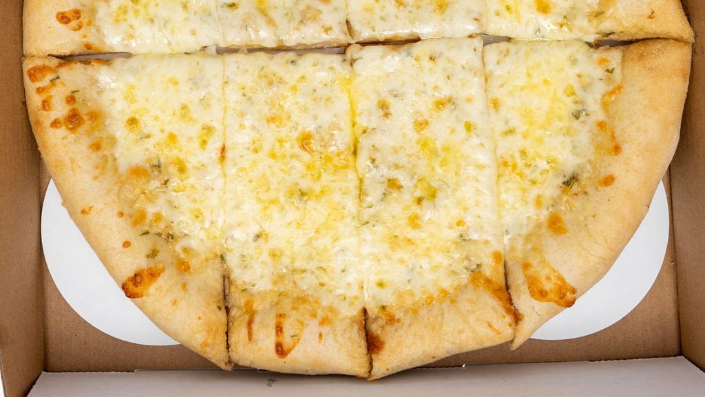 Vito’S Stix · Fresh-baked pizza dough with garlic, mozzarella + red sauce.