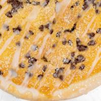 Dessert Pizza · Fresh-baked pizza dough with cake batter, chocolate chips, cream cheese icing.
*Note: Desser...