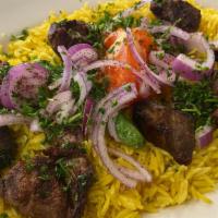 Lamb Kabob Plate · Marinated Chunks Of Lamb Char Grilled To Perfection. Served Over Basmati Rice