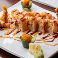 Pink Girl Roll · Tempura fried shrimp, cheese, avocado, cucumber, spicy crunch tuna with soy paper.