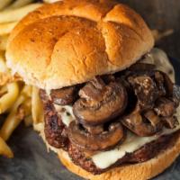 The Swiss Mushroom Burger · Exotic half pound sirloin beef patty topped with grilled onions, grilled mushrooms and swiss...