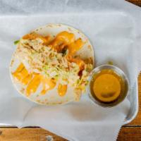 Spicy Shrimp Taco · Lightly battered fried shrimp, Boom Boom sauce, jalapeño coleslaw with a side of Bang Bang s...