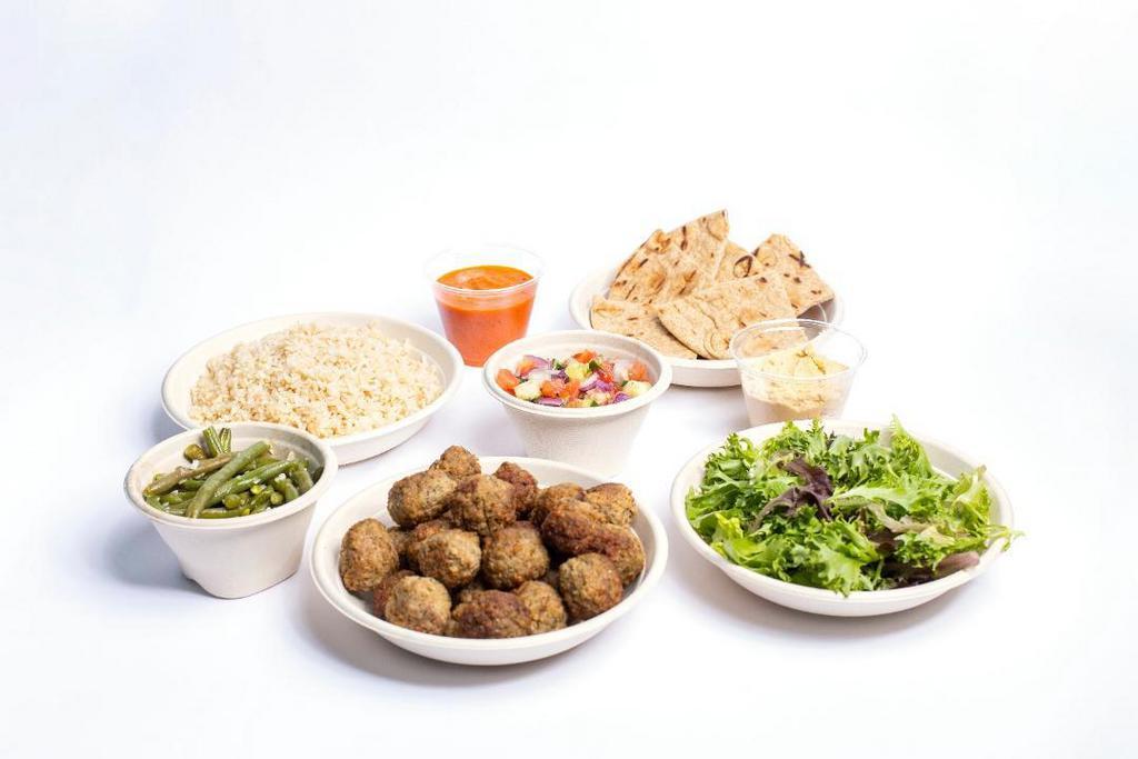 Fresko Family Meal · (Feeds 4-6) comes with your choice of 2. bases, I protein, 2 sauces. and includes sides of garlic. green beans, village salad, and pita
