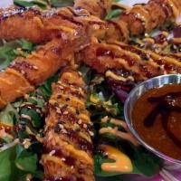 Tnt Shrimp · It's dy-na-mite! Crispy shrimp tempura glazed with sweet chili, savory eel sauce and a sprin...