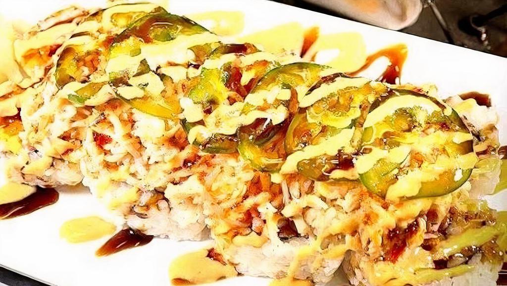 Electric Roll · Cajun seasoned crawfish, cream cheese, crab stick inside, baked krabmeat and jalapenos outside, topped with spicy mayo, sweet chili and eel sauce.