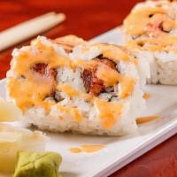 Spicy Tuna Roll · Copped spicy red tuna inside, topped with spicy mayo.