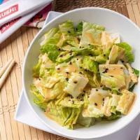 Ginger Salad · Chopped romaine with a sweet refreshing ginger sesame dressing.