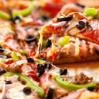 Classic Vegetarian · Our delicious homemade pizza sauce base, onions, green pepper, black olives, tomatoes, mushr...