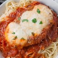 Chicken Parmesan · Breaded chicken breast with marinara sauce, served over spaghetti topped with mozzarella.