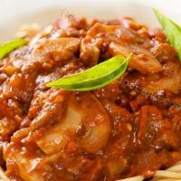 Spaghetti With Meat Sauce · Cooked ground beef cooked with our delicious homemade marinara sauce baked with spaghetti no...