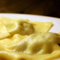 Shrimp And Crab Ravioli · Hexagon shape ravioli filled with shrimp and crab meat baked in fresh homemade alfredo sauce...