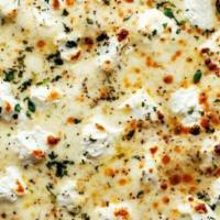 White Pizza · No sauce, combination of ricotta, tomato, basil, and garlic.