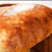 Meat Lover Calzone · Pepperoni, sausage, bacon, beef.