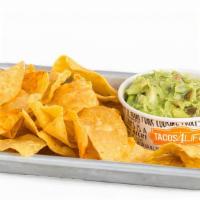 Personal Guacamole · A personal portion of our house-made guacamole and our magic seasoning seasoned tortilla chi...