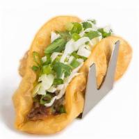 Carnitas · Citrus and cumin slow-roasted pork, house-made queso, cabbage, cilantro, green onion on our ...