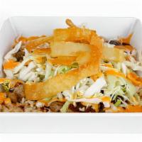 Korean Bbq Rice Bowl · Cumin-scented rice with cabbage and yum yum sauce, topped with wonton.