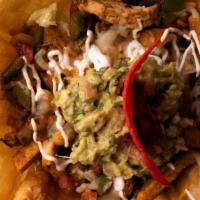 Taco Salad · Topped with choice of any meat. Served with salsa, topped with sour cream, pico de gallo, be...