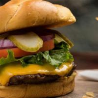 Classic Burger · Cheese, lettuce, tomato, red onions, pickles, kettle chips