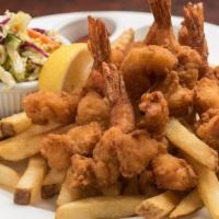 Golden Fried Shrimp · With fries and coleslaw.