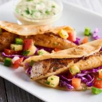 Fish Tacos · Grilled, blackened, or fried tilapia, roasted chile mayo, red cabbage, pineapple pico de gal...