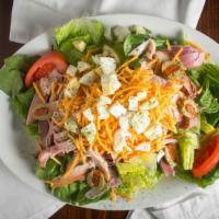 Chef Salad · Traditional chef salad with strips of ham, turkey breast, cheese, boiled eggs, Creole tomato...