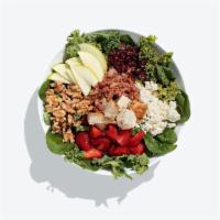 Forbidden Fruit Salad · Baby spinach, kale power blend, garlic roasted chicken, bacon, strawberries, dried cranberri...