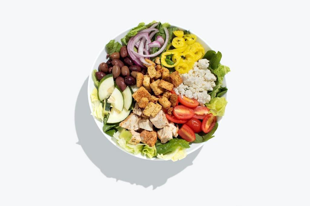 Hide & Go Greek Salad · Baby spinach, iceberg, chickpeas, artichoke hearts, Kalamata olives, cucumber, cherry tomatoes, red onion, feta cheese, topped with croutons, and served with Greek Feta dressing.
