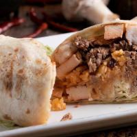 Burrito Texano · 12-inch flour tortilla filled with grilled chicken, steak, shrimp, rice, beans, lettuce, and...