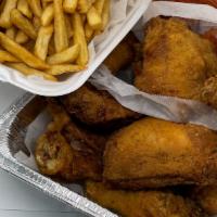 15Pc Legs & Thighs · 15pc Legs & Thighs Served with Family Seasoned Fries & 2 Liters Soda