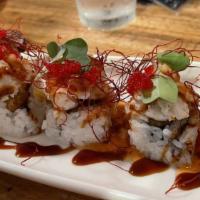 Saltwater Crab Roll · Shrimp tempura, cucumber, topped with lump crab, eel sauce, sweet chilli, thin dry chilli, m...