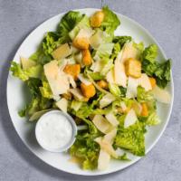 Caesar Salad · Crisp romaine lettuce, parmesan cheese and crunchy croutons. Served with caesar dressing on ...