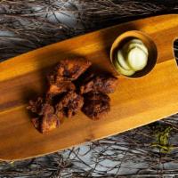 Chicken Wings · Classic bone-in wings oven- baked, cooked to order perfectly crisp, and tossed with your cho...