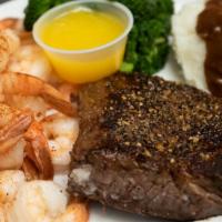 Surf And Turf · 10 oz marinated sirloin and a 1/2 pound steamed or grilled shrimp. Served with your choice o...