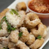 Fried Calamari · Crispy breaded, plain or old bay. Served with marinara or sweet chile sauce.
